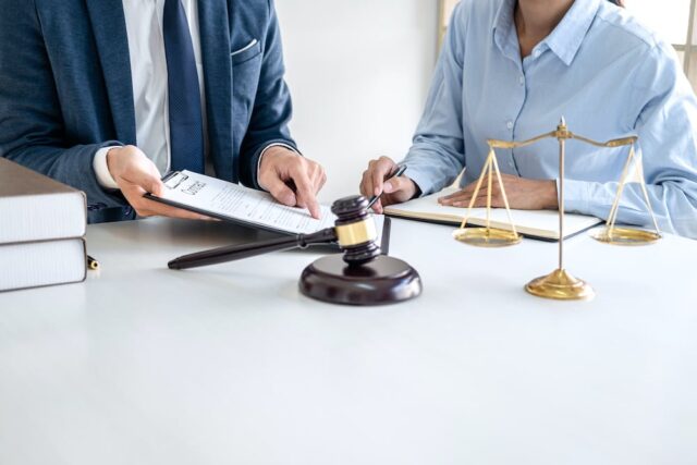 lawyer and client sitting at a table